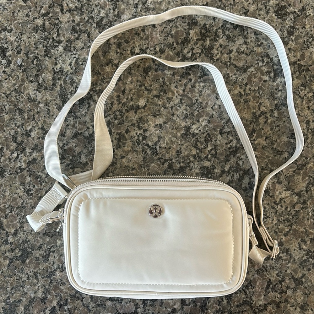 Like new lululemon camera bag - cream color